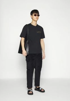 MOSCHINO Print T-shirt - Black -MOSCHINO SHOP 05583b190f714228b9d547b53ed4ca0b