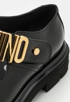 MOSCHINO Slip-ons - Nero -MOSCHINO SHOP 05eb81ccce6e4b4e8d802a4467b24059