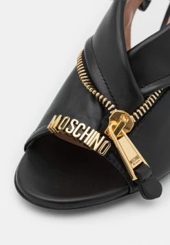 MOSCHINO Sandals - Nero -MOSCHINO SHOP 09feb28ddf824fe0ba70443cc08e50ed