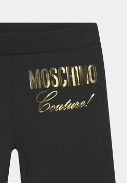 MOSCHINO Leggings - Trousers - Black -MOSCHINO SHOP 10d611dc63f1458088004fccbbcf3450