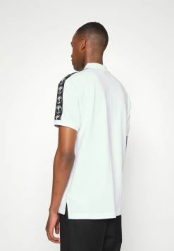 MOSCHINO UPPER BODY GARMENT - Polo Shirt - Fantasy White -MOSCHINO SHOP 13e74fd2eb3344938e80c15ad6c7fbc4