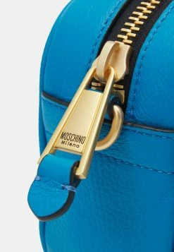 MOSCHINO LETTERING CHAIN CAMERA - Across Body Bag - Light Blue -MOSCHINO SHOP 14d8b393050b449da609381baaf9b3d9