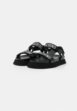 MOSCHINO Sandals - Nero -MOSCHINO SHOP 1687c95aa4704e24ba1a2ad5b52142e2