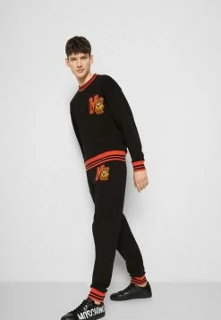 MOSCHINO TROUSERS - Tracksuit Bottoms - Black -MOSCHINO SHOP 1c23d971f1fc41acae2ad8b06d1760dc