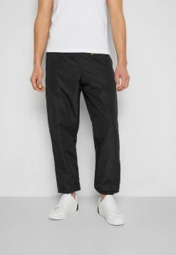 MOSCHINO TROUSERS - Tracksuit Bottoms - Black