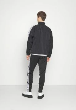 MOSCHINO OUTERWEAR - Training Jacket - Black -MOSCHINO SHOP 46b602caa38d400aae985318868d6935