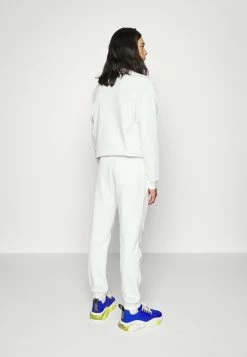 MOSCHINO Tracksuit Bottoms - Fantasy White -MOSCHINO SHOP 4bae190e0414409391b29052d7d5d4b5