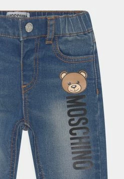 MOSCHINO TROUSERS UNISEX - Slim Fit Jeans - Blu Denim -MOSCHINO SHOP 6c3c36ce36ee4be3b69580d843299f8b