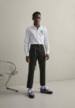 MOSCHINO MATTE EMERIZED - Trousers - Black