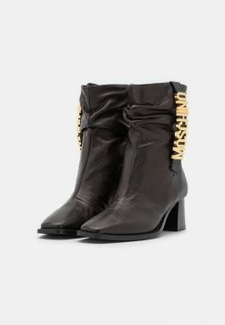 MOSCHINO Classic Ankle Boots - Nero -MOSCHINO SHOP 7b4710c75d8d4a97b587f20bb6fd32f4