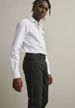 MOSCHINO MATTE EMERIZED - Trousers - Black -MOSCHINO SHOP 7c1b1f59f65f4269a2f9e44cf6f7c4b7