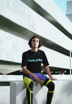 MOSCHINO TROUSERS - Tracksuit Bottoms - Black/purple/yellow