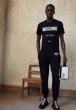 MOSCHINO TROUSERS - Tracksuit Bottoms - Black