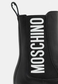 MOSCHINO Classic Ankle Boots - Nero -MOSCHINO SHOP 9a256101df604fc9bb9b1545594664d6