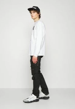 MOSCHINO MATTE EMERIZED - Cargo Trousers - Black -MOSCHINO SHOP a2428c428f274e358801ca0d5088361e