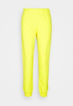 MOSCHINO TROUSERS - Tracksuit Bottoms - Yellow