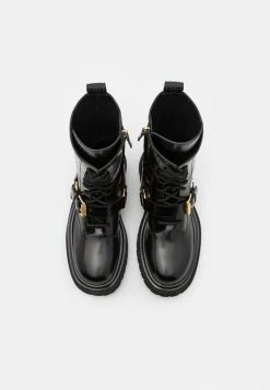 MOSCHINO Lace-up Boots - Nero -MOSCHINO SHOP b183f7a854f44fb5b51606cf16589020