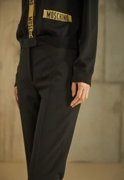 MOSCHINO BONDAGE BUCKLE - Trousers - Black -MOSCHINO SHOP b60222eb14524d9cb09b86ccbe47e5e1