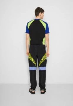 MOSCHINO TROUSERS - Tracksuit Bottoms - Black -MOSCHINO SHOP b9b1048ee2c14910951de906d662f758