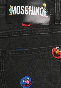 MOSCHINO SESAME STREET TROUSERS - Jeans Tapered Fit - Black -MOSCHINO SHOP d23b11438ae24b16a2198a2112fb860e