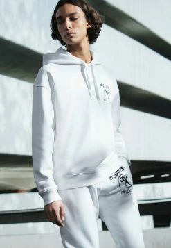 MOSCHINO TROUSERS - Tracksuit Bottoms - White