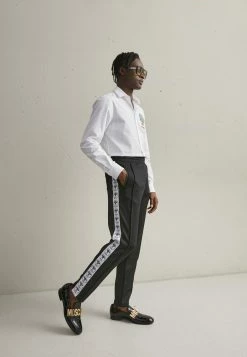 MOSCHINO TROUSERS - Tracksuit Bottoms - Fantasy Black