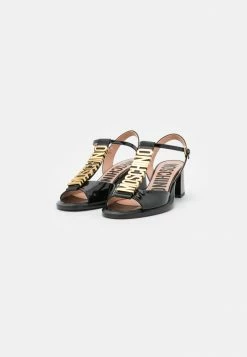 MOSCHINO Sandals - Nero -MOSCHINO SHOP f4ca2a1bbdf14eaab13abf61c5299e69