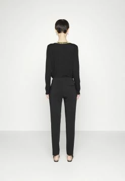 MOSCHINO BONDAGE BUCKLE - Trousers - Black -MOSCHINO SHOP fdd21ebadc3545d3a01bfcbb041a1e05