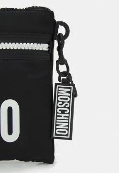 MOSCHINO UNISEX - Wash Bag - Black, White -MOSCHINO SHOP ff890ffbf1784a4a899cacf5e3d6121a